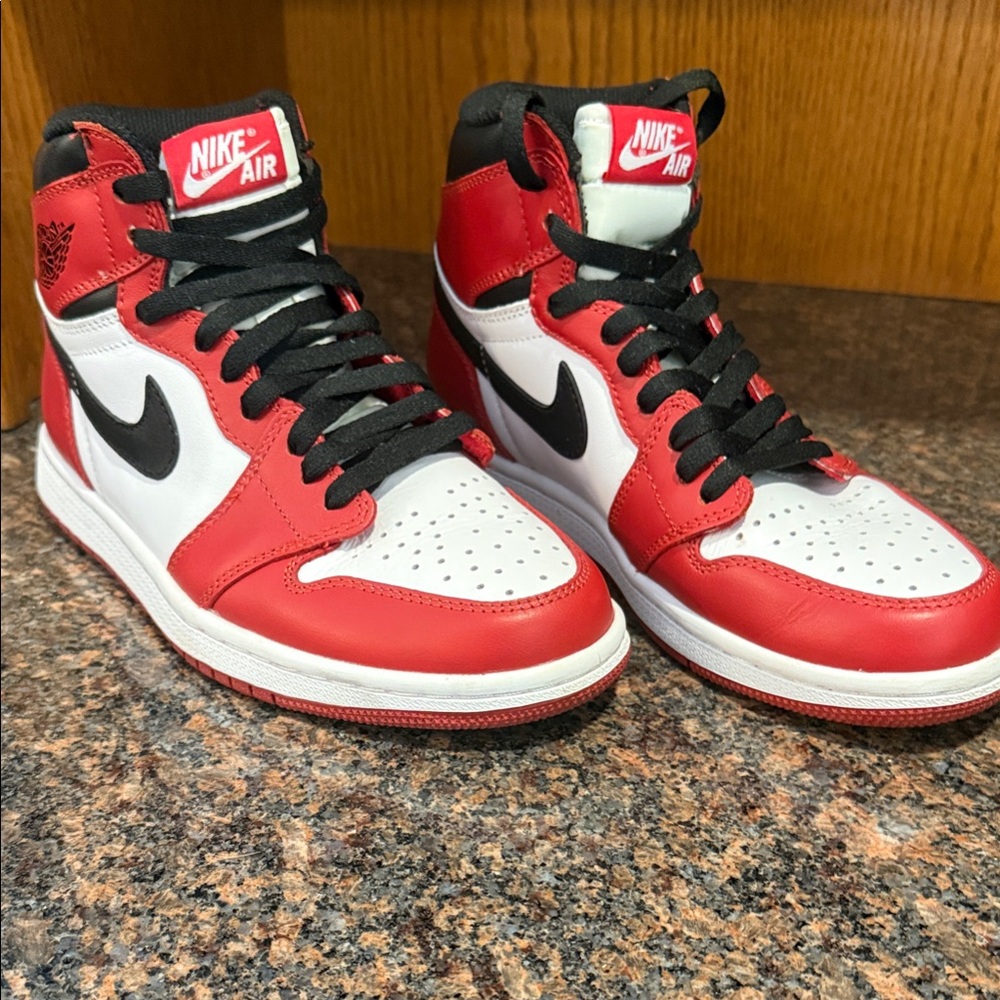 Nike Air Jordan Retro 1- University red. Red and White High-Top Sneakers